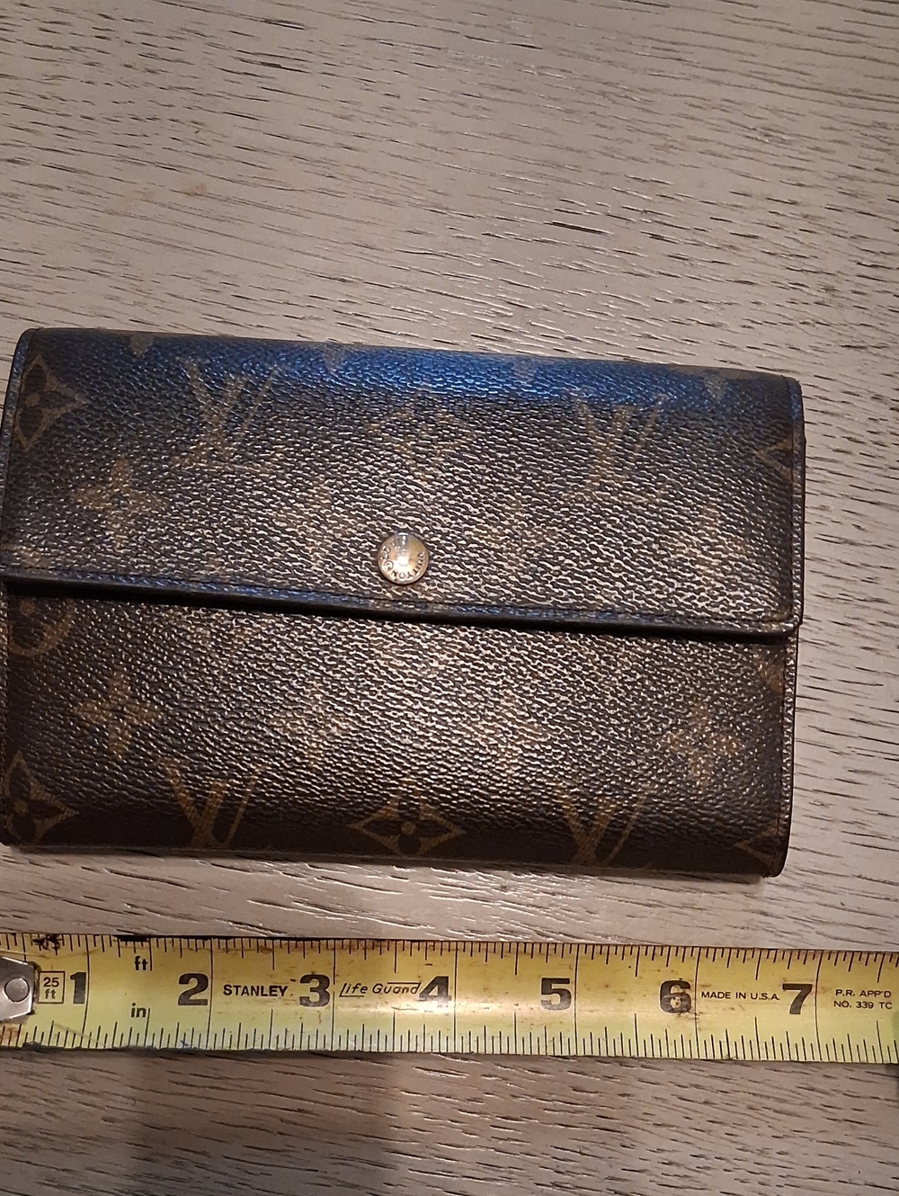 Monogram  Wallet in    brown Approx 6x7 , Final Markdown Price.  No Lower